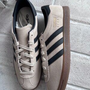 Adidas Stadt in the "Chalk White/Core Black/Gum" (product code JQ9012). 9M/10.5W